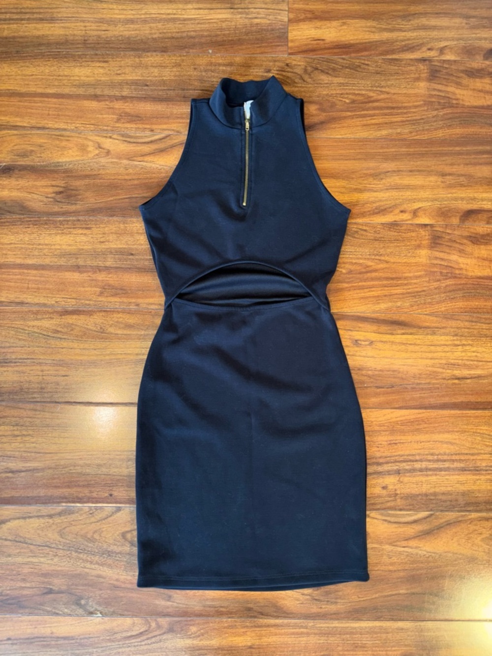 Black Sleeveless Zip-Front Mini Dress with Waist Cutout